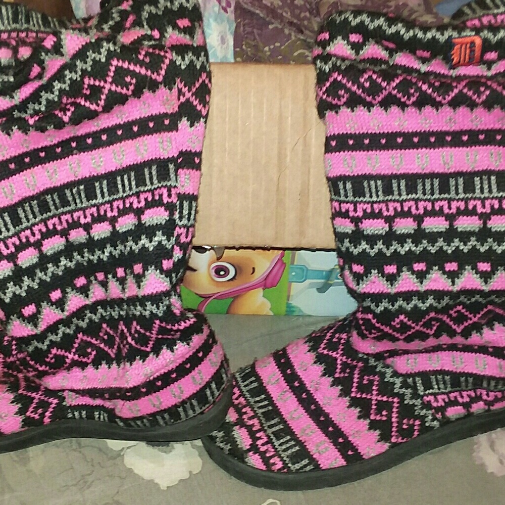 Pink and black slipper shoes